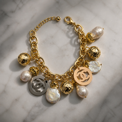 The Golden CC Charm Bracelet.