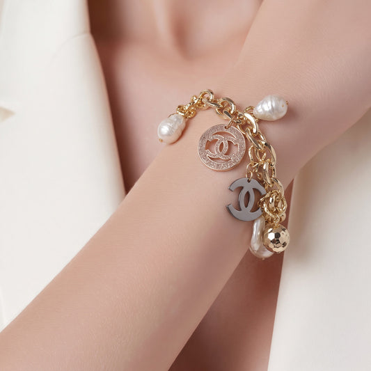 The Golden CC Charm Bracelet.