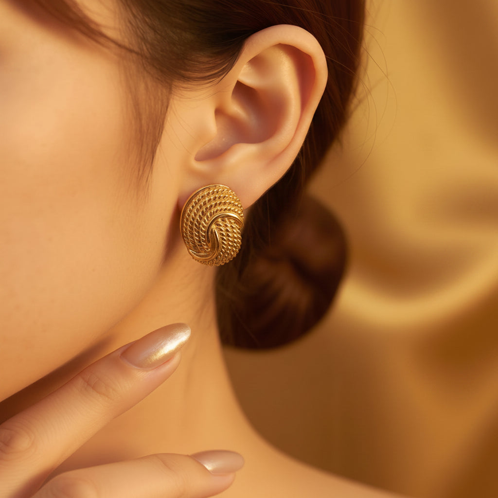 The Golden Woven Dome Earrings.