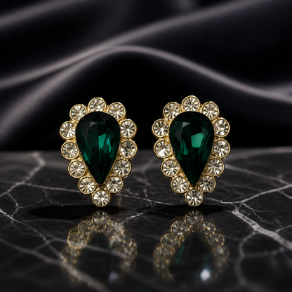 The Emerald Teardrop Halo Earrings.