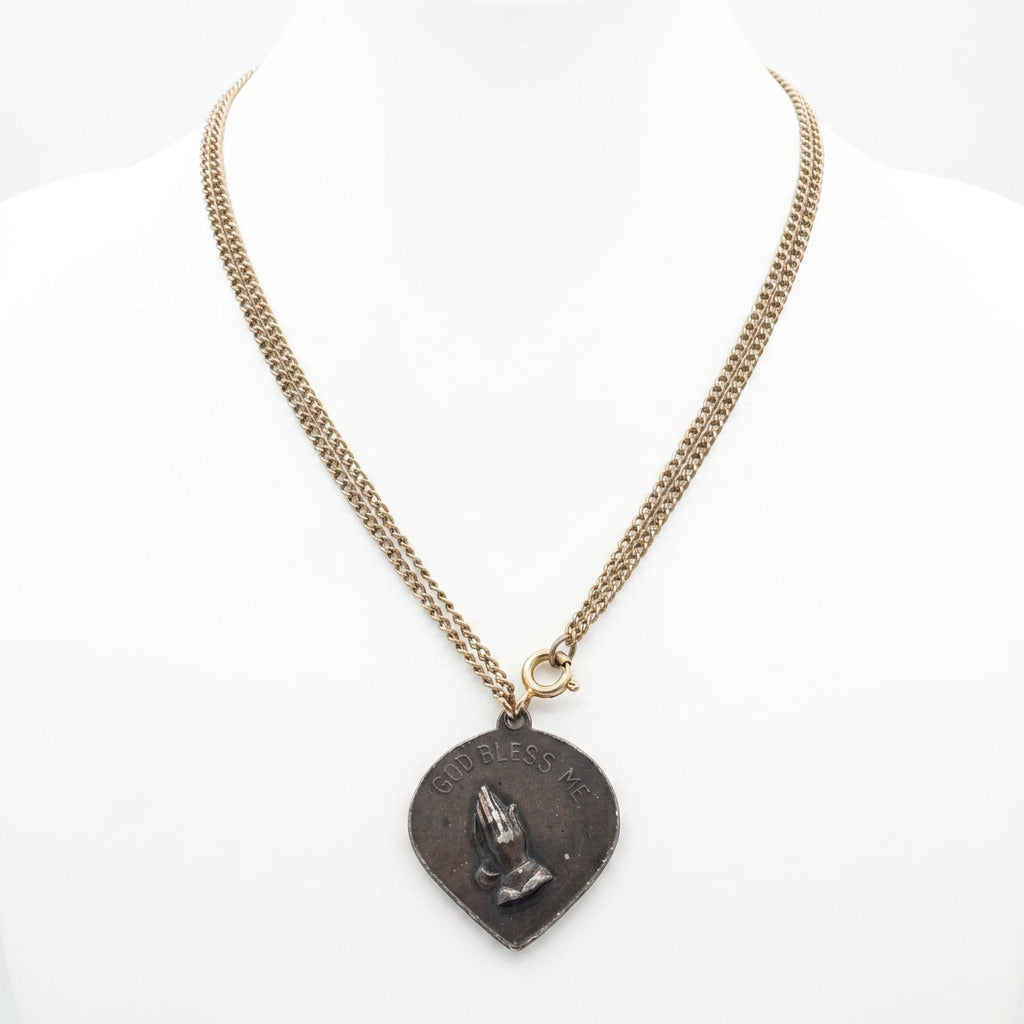 The Classical Profile Pendant Necklace.