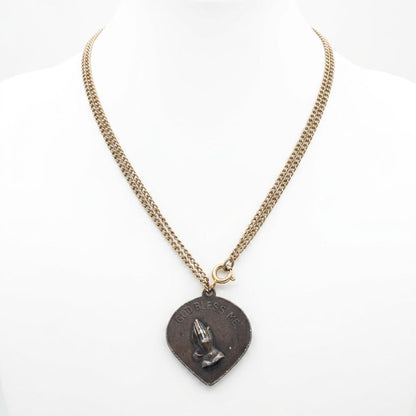 The Classical Profile Pendant Necklace.