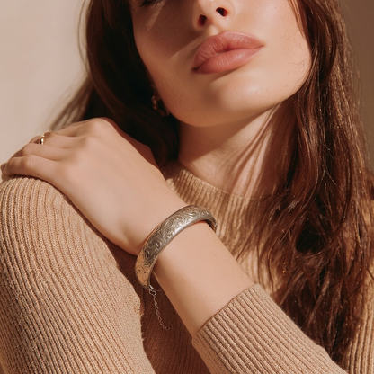The Golden Repoussé Floral Bangle.