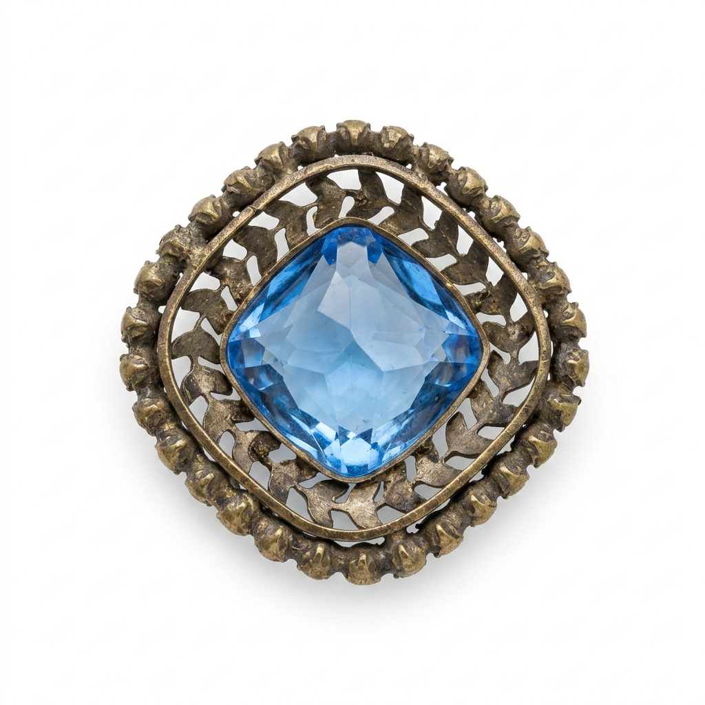 The Sapphire Blue Laurel Brooch.