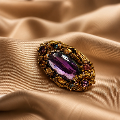 The Amethyst Ornate Oval Brooch.