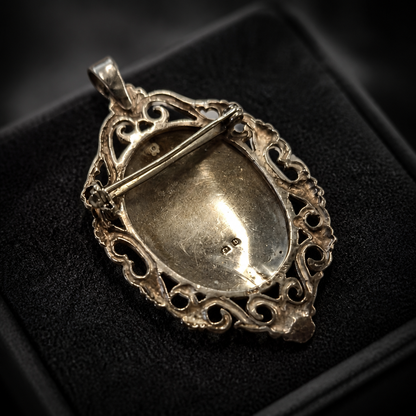 The Antique Silver Portrait Brooch.