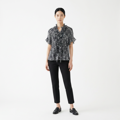 The Black &amp; White Animal Print Chiffon Blouse.