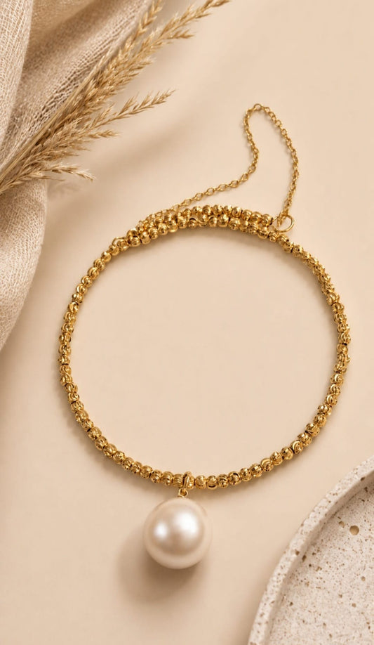 The Sovereign Golden Solstice Pearl Bangle