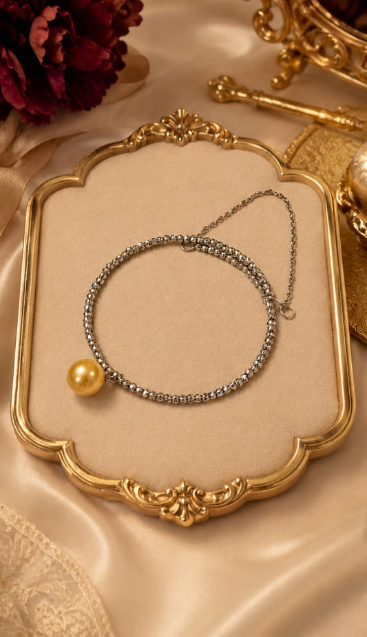 The Aurelia Pearl Bangle on display tray