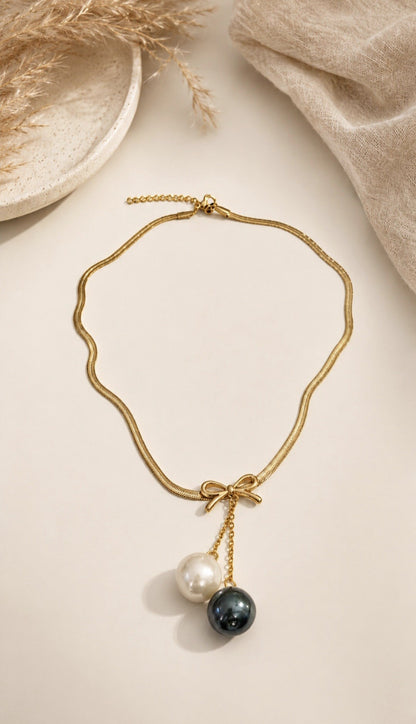 The Midnight & Ivory Bow Necklace